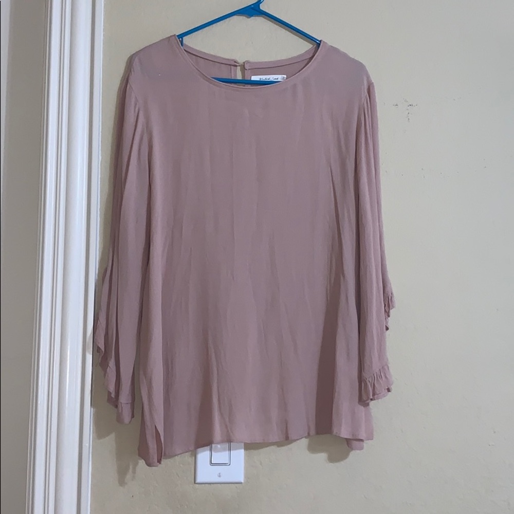 Soft blush pink shark bite sleeve blouse
